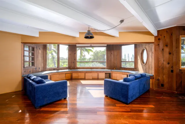 a view of balcony with wooden floor