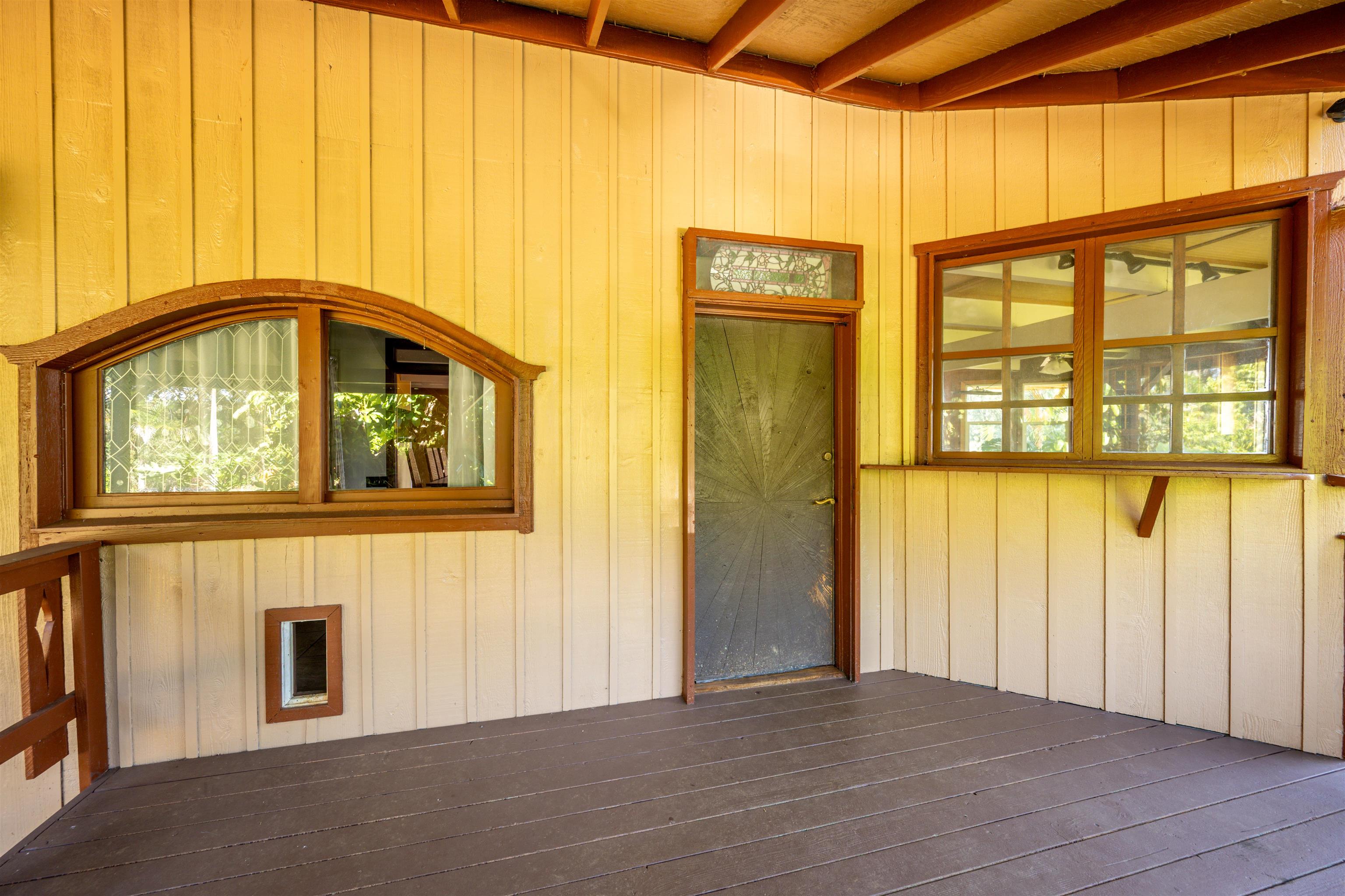810 Upper Ulumalu Road Haiku, HI 96708 - Photo 5 of 46 a view of an empty room with a window