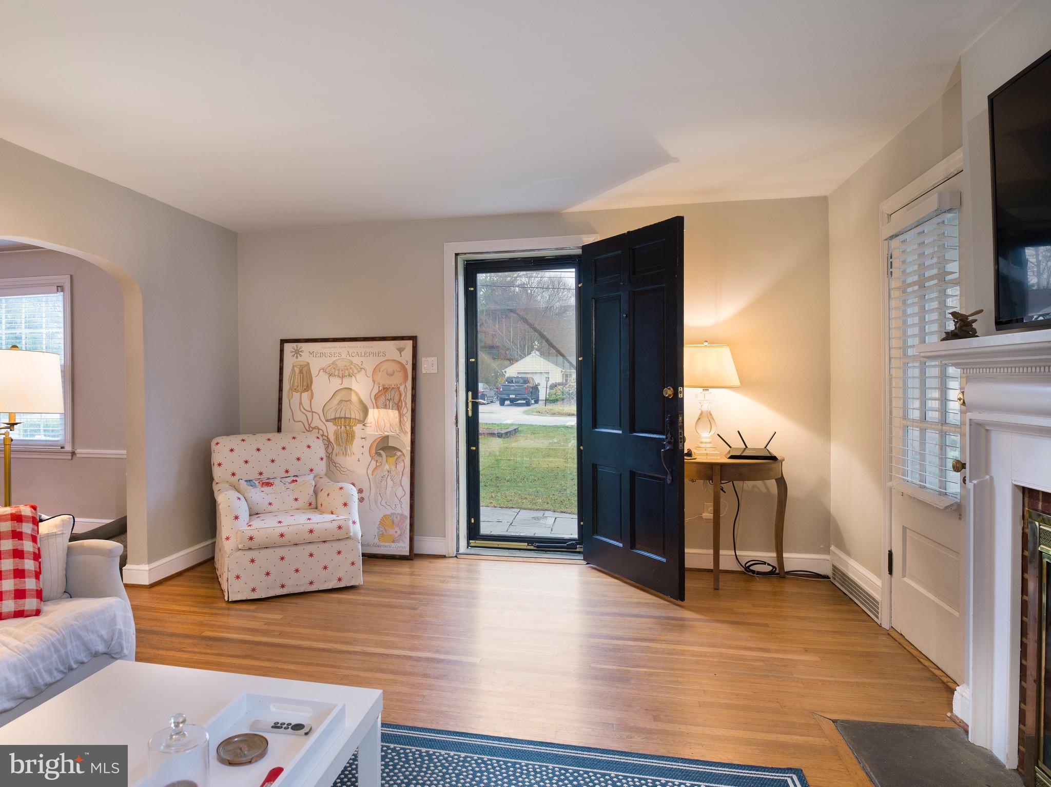 312 Old Lancaster Road Devon, PA 19333 - Photo 11 of 25 a living room with furniture and a fireplace