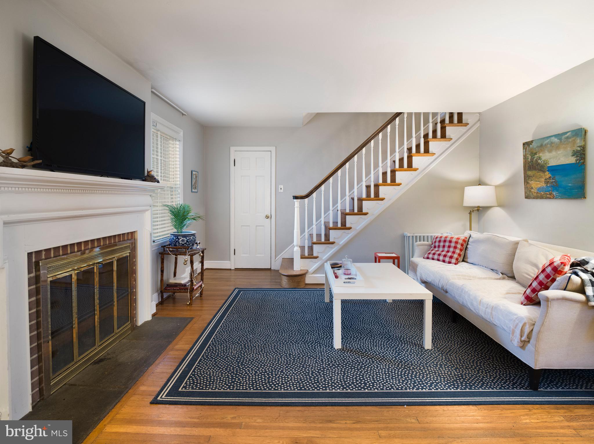 312 Old Lancaster Road Devon, PA 19333 - Photo 12 of 25 a living room with furniture and a fireplace