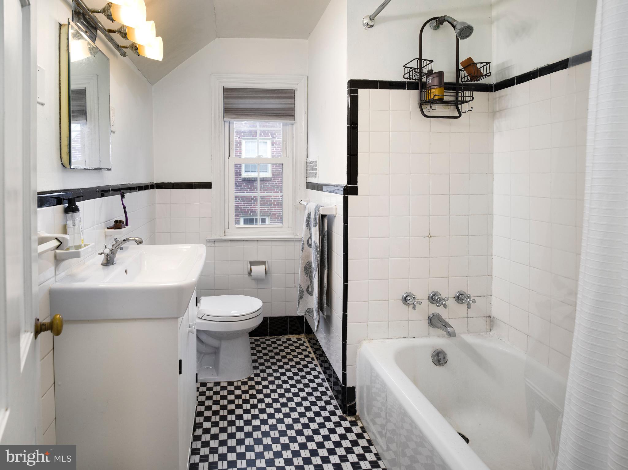 312 Old Lancaster Road Devon, PA 19333 - Photo 21 of 25 a bathroom with a sink a toilet and shower