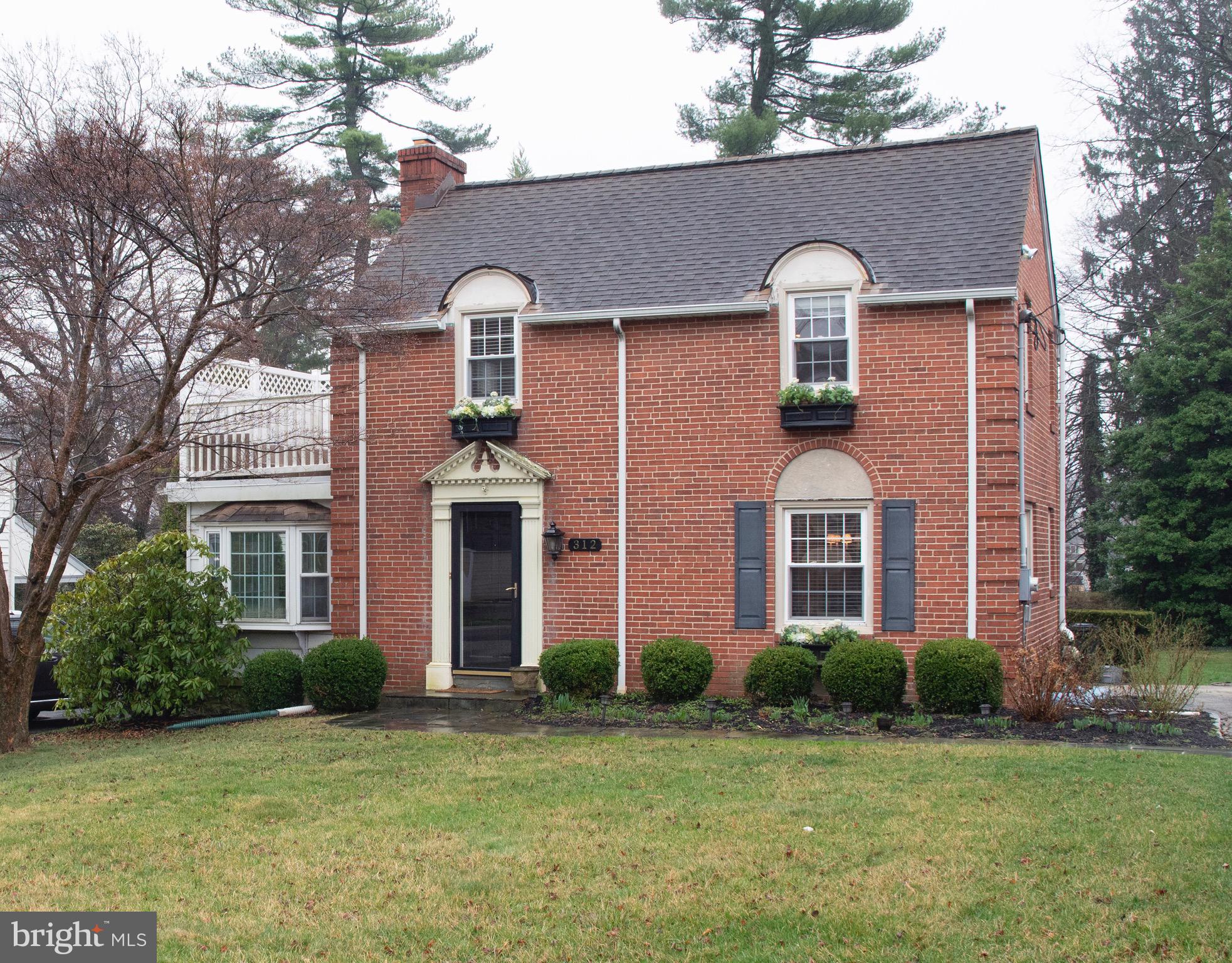 312 Old Lancaster Road Devon, PA 19333 - Photo 3 of 25 a front view of a house with a yard