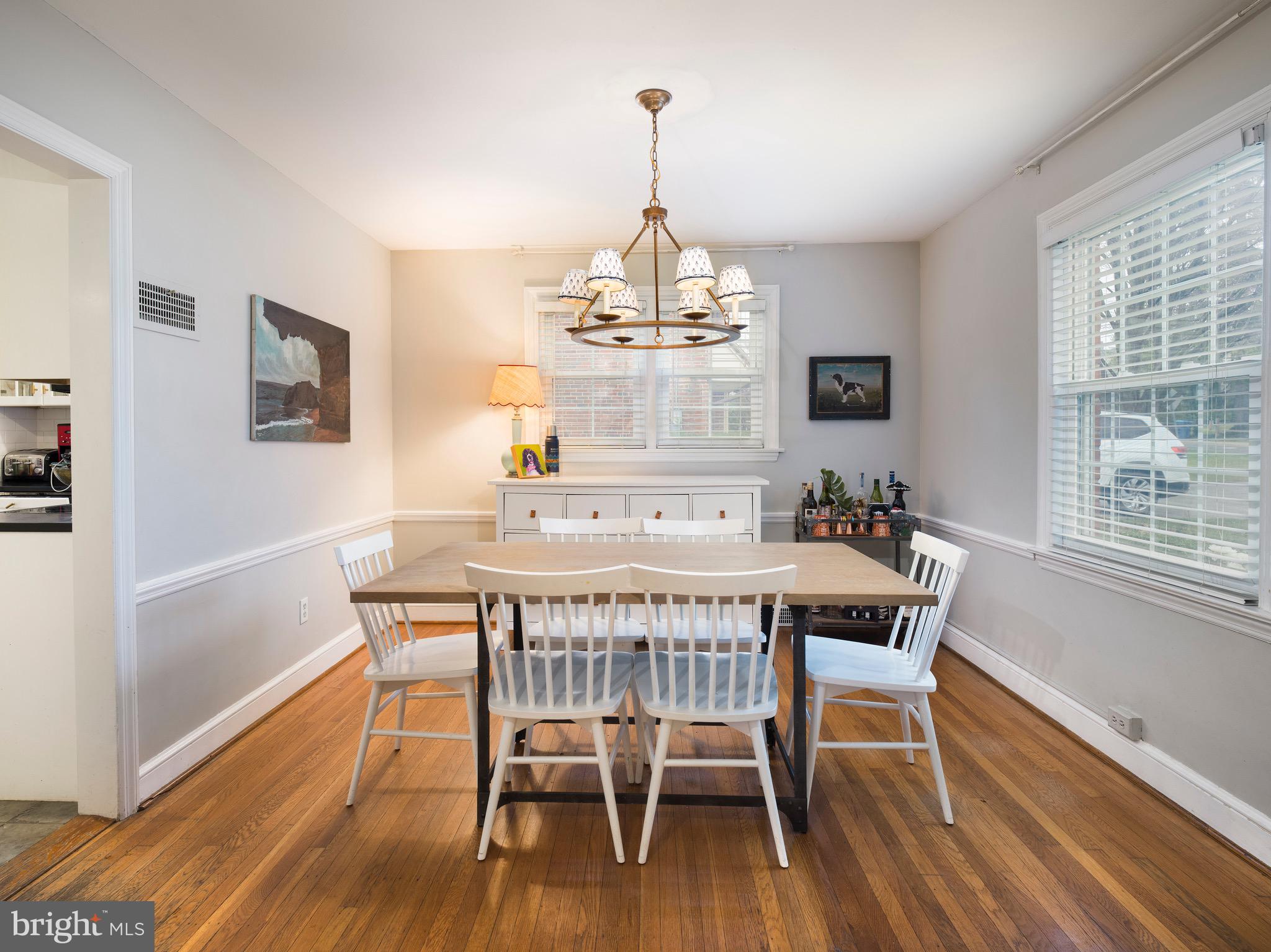 312 Old Lancaster Road Devon, PA 19333 - Photo 9 of 25 a view of a dining room with furniture window and wooden floor