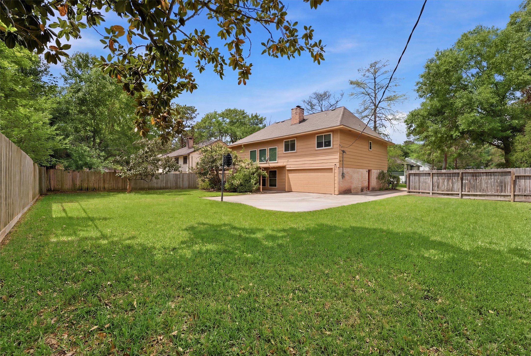 8115 Theisswood Road Spring, TX 77379 - Photo 29 of 36 a view of a house with a yard
