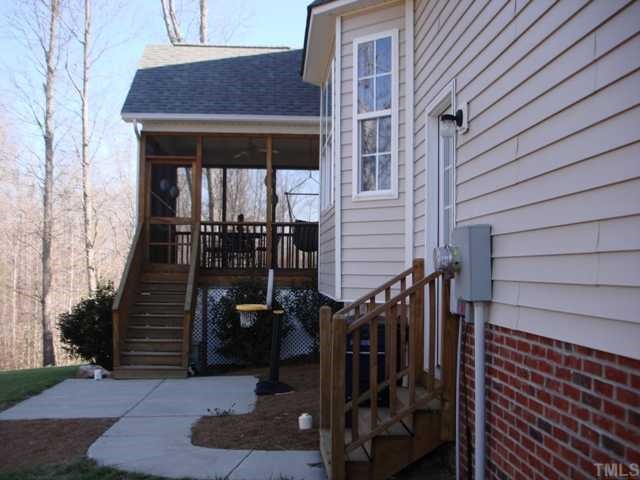 1221 Red Brick Road Garner, NC 27529 - Photo 11 of 11 a view of a house with wooden fence