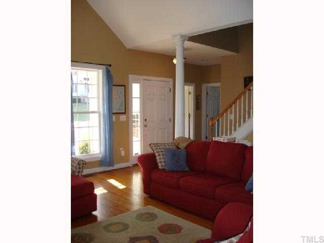 1221 Red Brick Road Garner, NC 27529 - Photo 3 of 11 a living room with furniture and a window