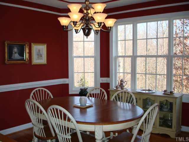 1221 Red Brick Road Garner, NC 27529 - Photo 6 of 11 a view of a dining room with furniture window and outside view