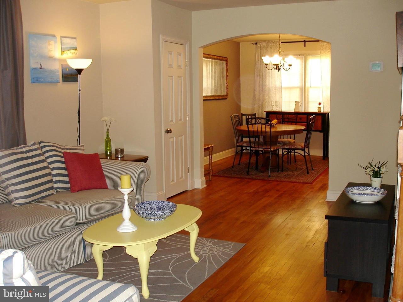 3412 Dunran Road Dundalk, MD 21222 - Photo 2 of 25 a view of a dining room with furniture and wooden floor