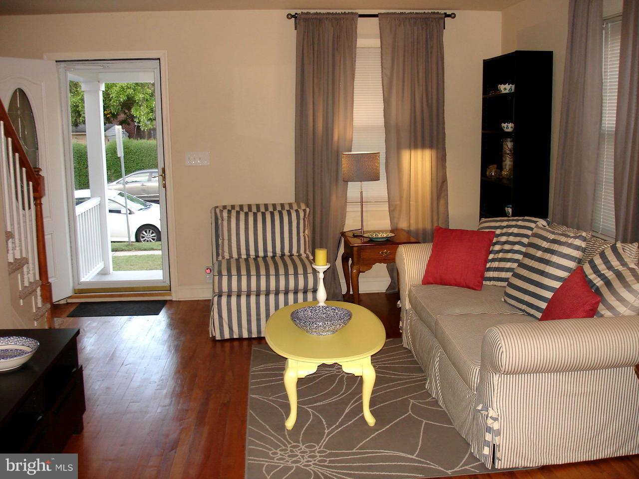3412 Dunran Road Dundalk, MD 21222 - Photo 14 of 25 a living room with furniture and a large window