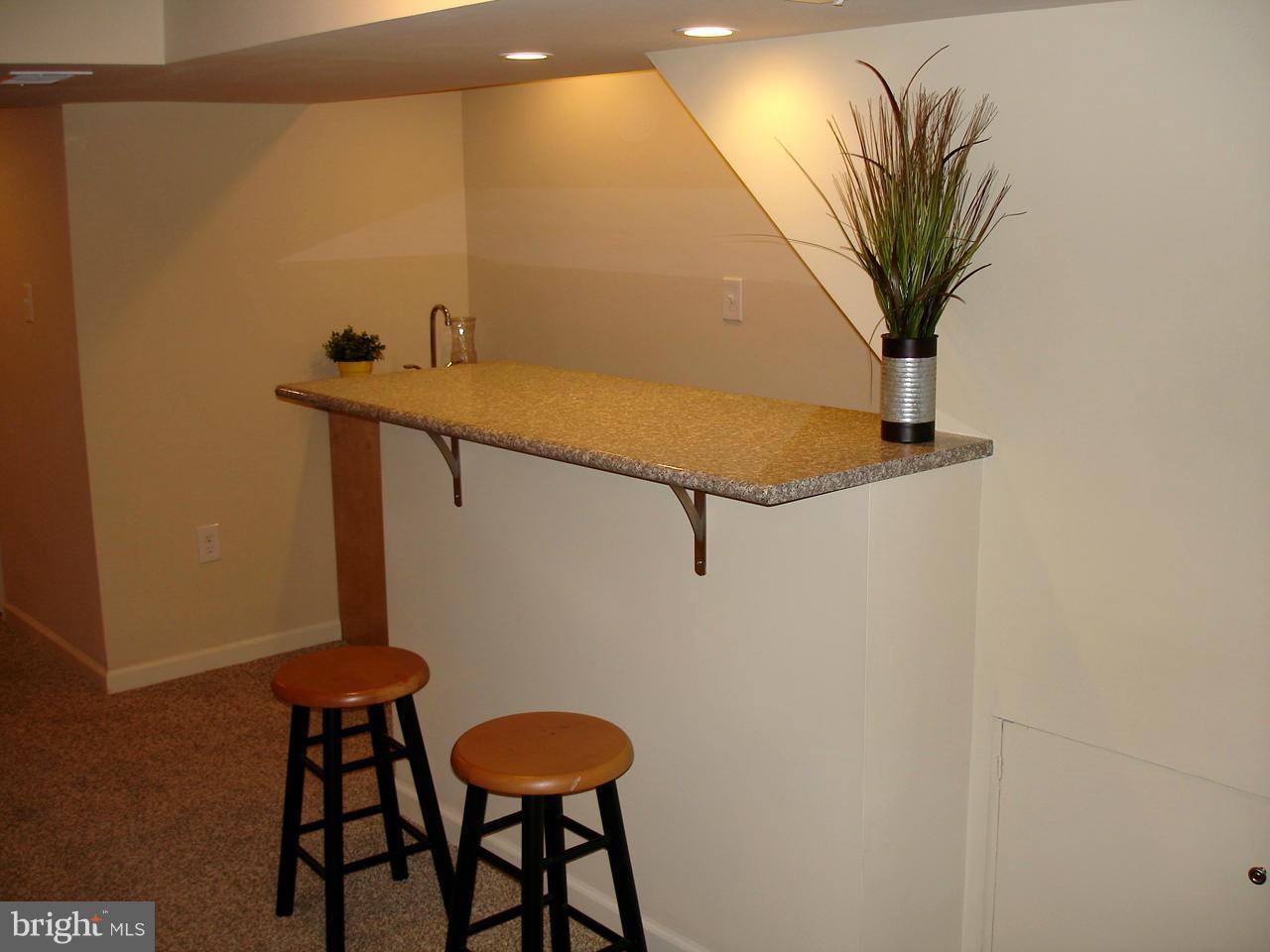 3412 Dunran Road Dundalk, MD 21222 - Photo 16 of 25 a view of entryway with a table and a chair