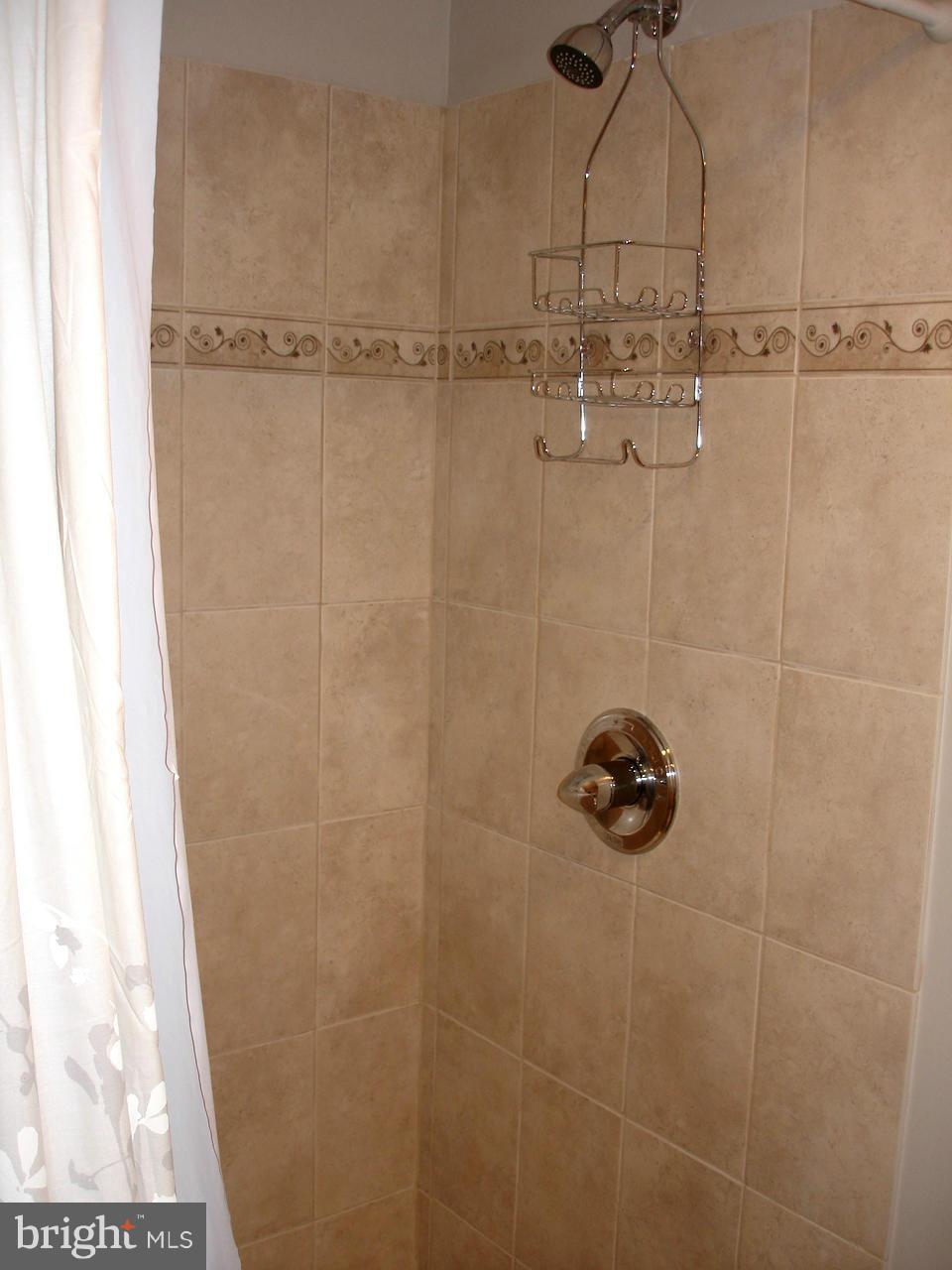 3412 Dunran Road Dundalk, MD 21222 - Photo 18 of 25 a bathroom with a shower