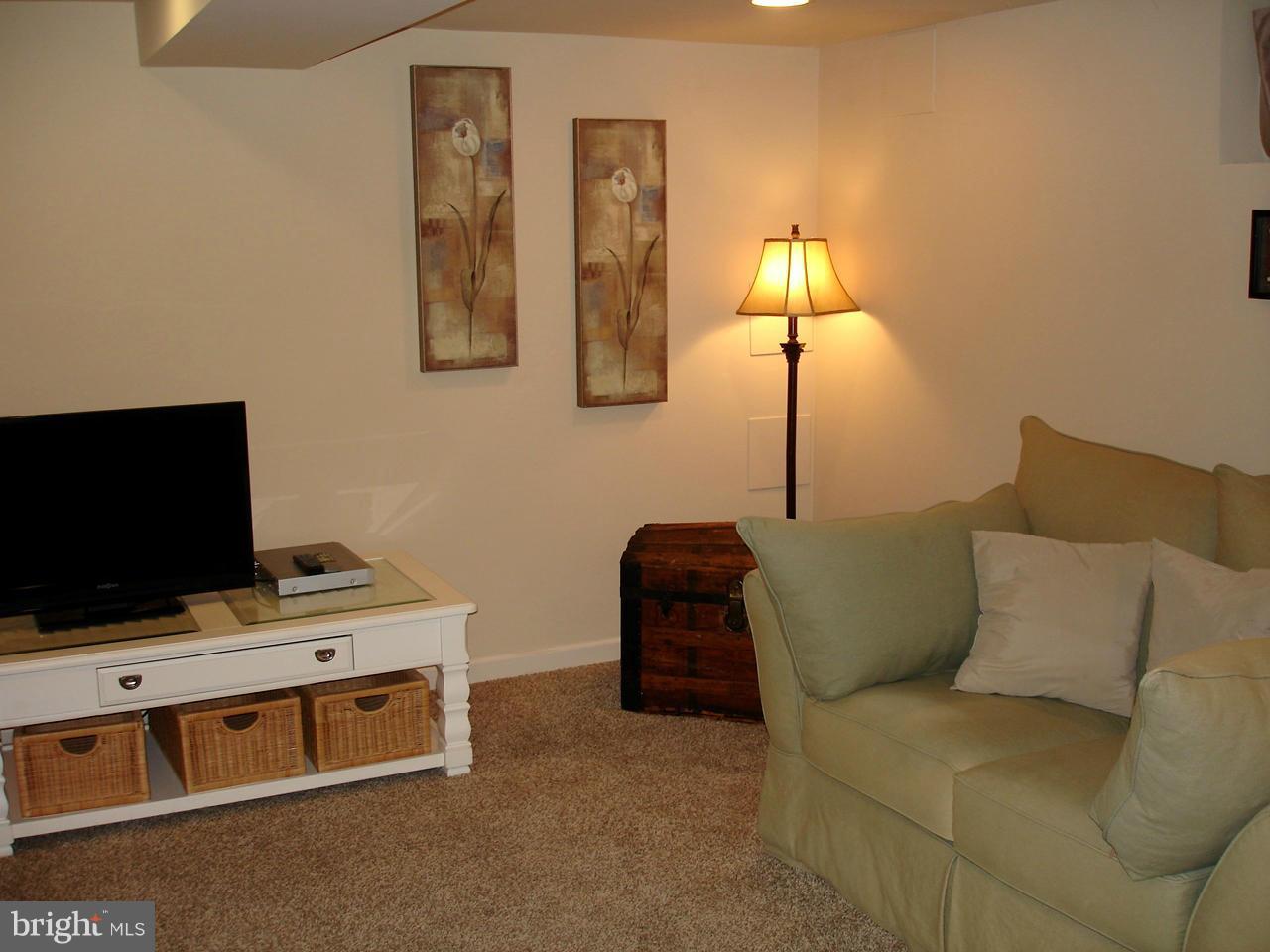 3412 Dunran Road Dundalk, MD 21222 - Photo 19 of 25 a living room with furniture and a flat screen tv