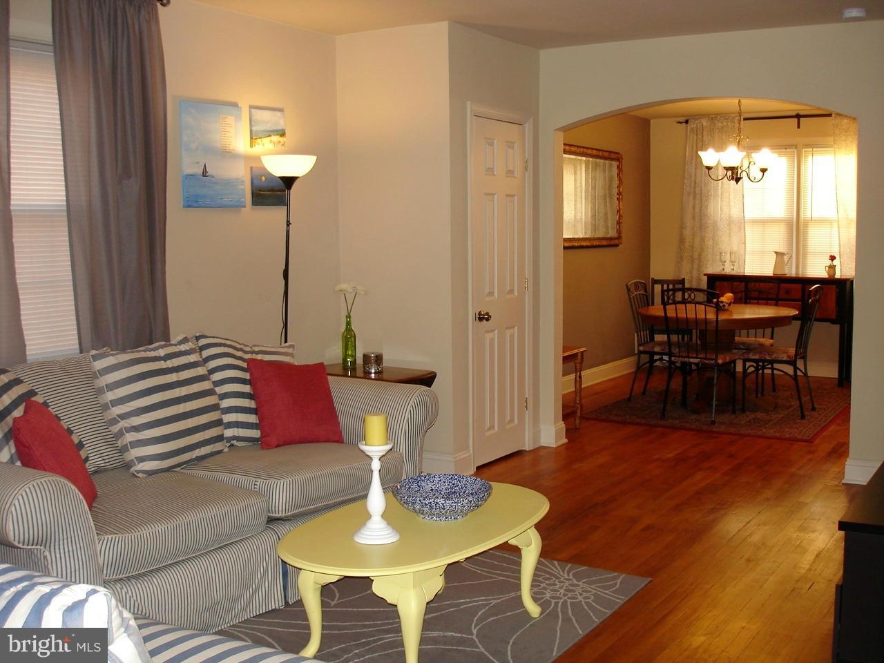 3412 Dunran Road Dundalk, MD 21222 - Photo 3 of 25 a living room with furniture and wooden floor