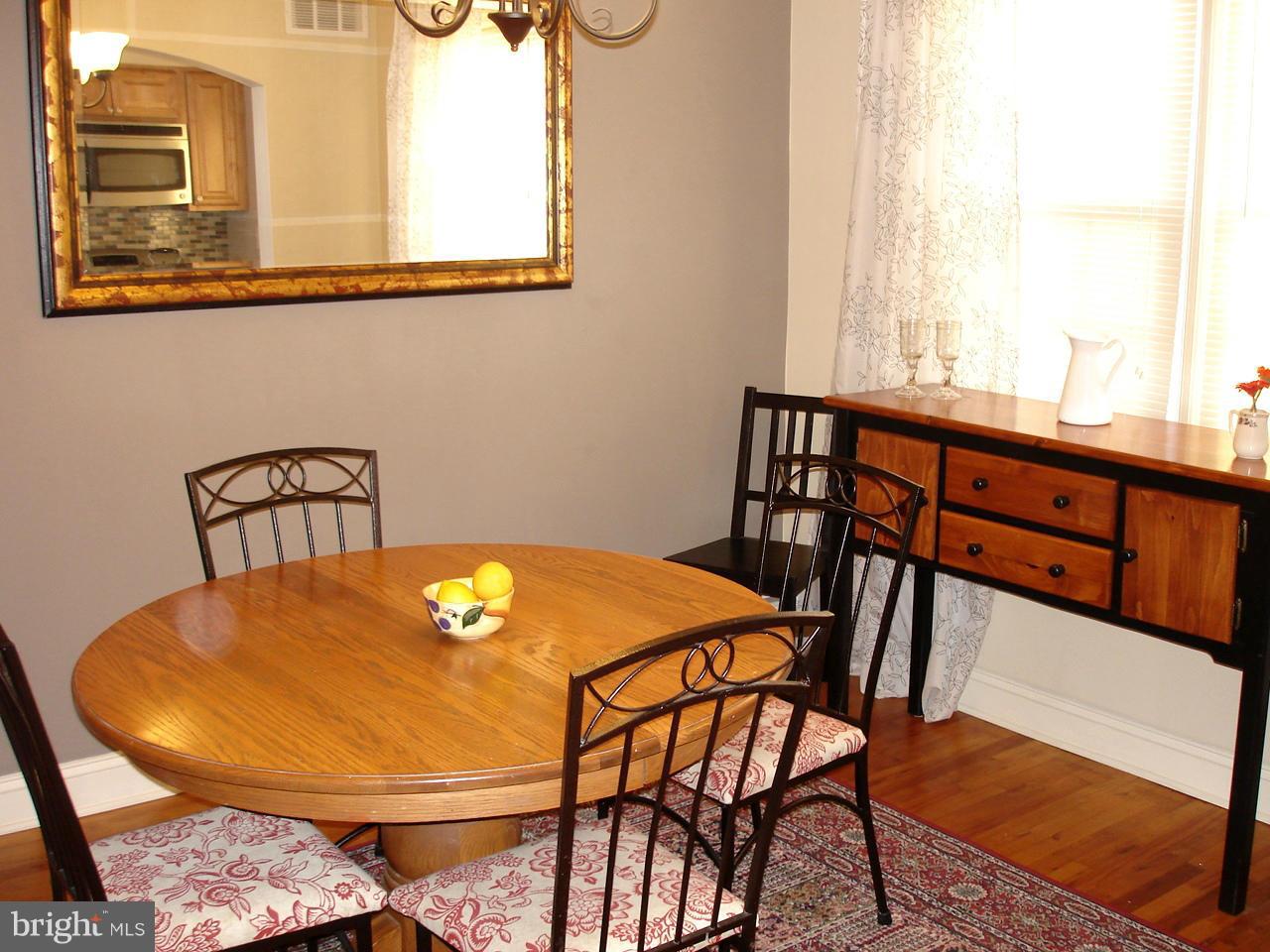 3412 Dunran Road Dundalk, MD 21222 - Photo 7 of 25 a view of a dining room with furniture and window