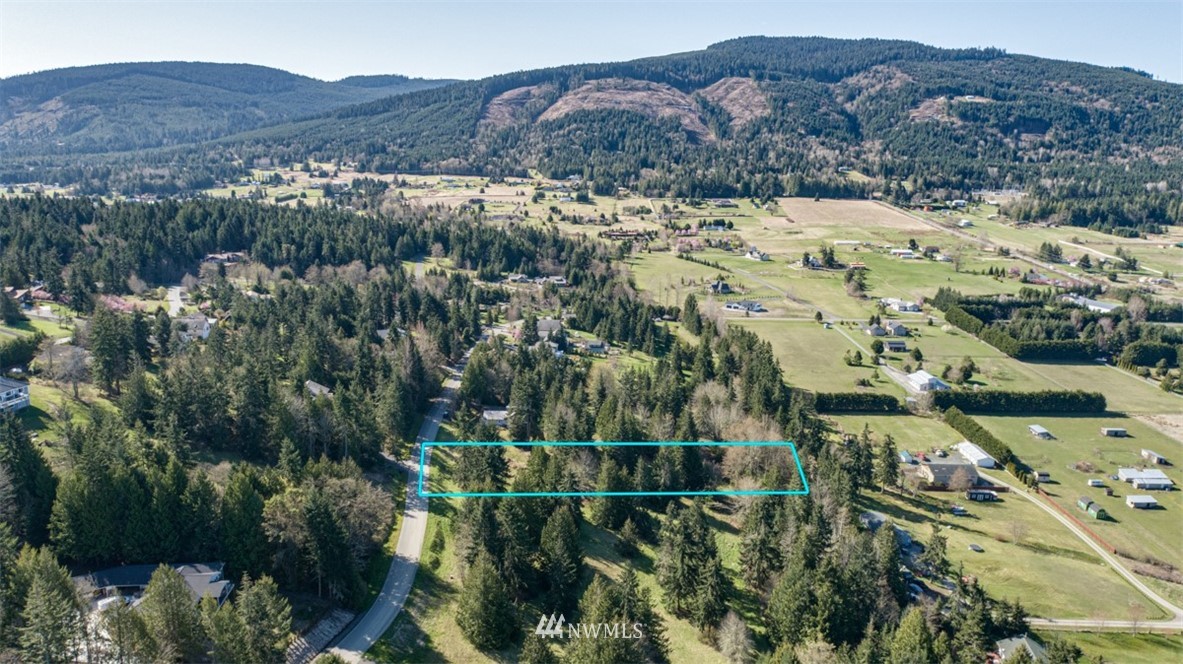 2 Fox Hollow Road Sequim, WA 98382 - Photo 14 of 22 an aerial view of mountains residential house and green space