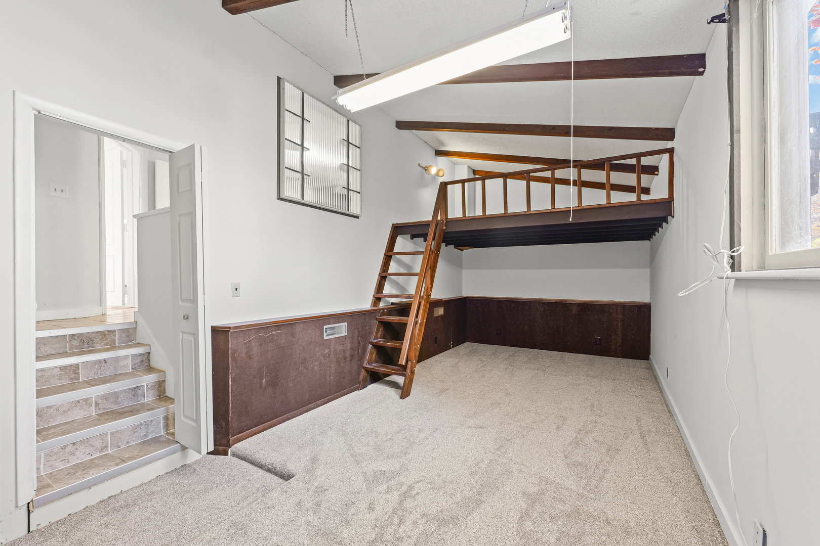 302 Flora Drive Champaign, IL 61821 - Photo 17 of 34 an empty room with windows