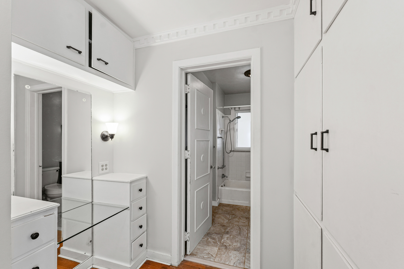 302 Flora Drive Champaign, IL 61821 - Photo 19 of 34 a bathroom with a shower and closet