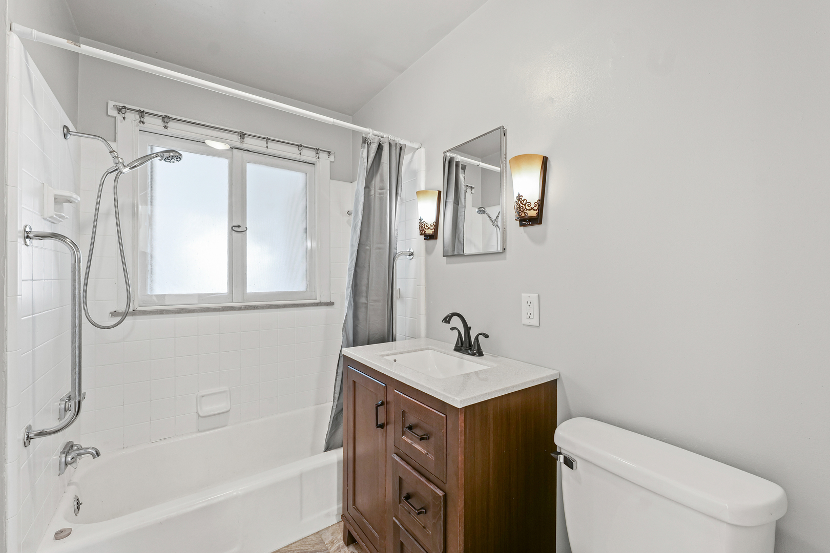 302 Flora Drive Champaign, IL 61821 - Photo 20 of 34 a bathroom with a sink a toilet and a bathtub