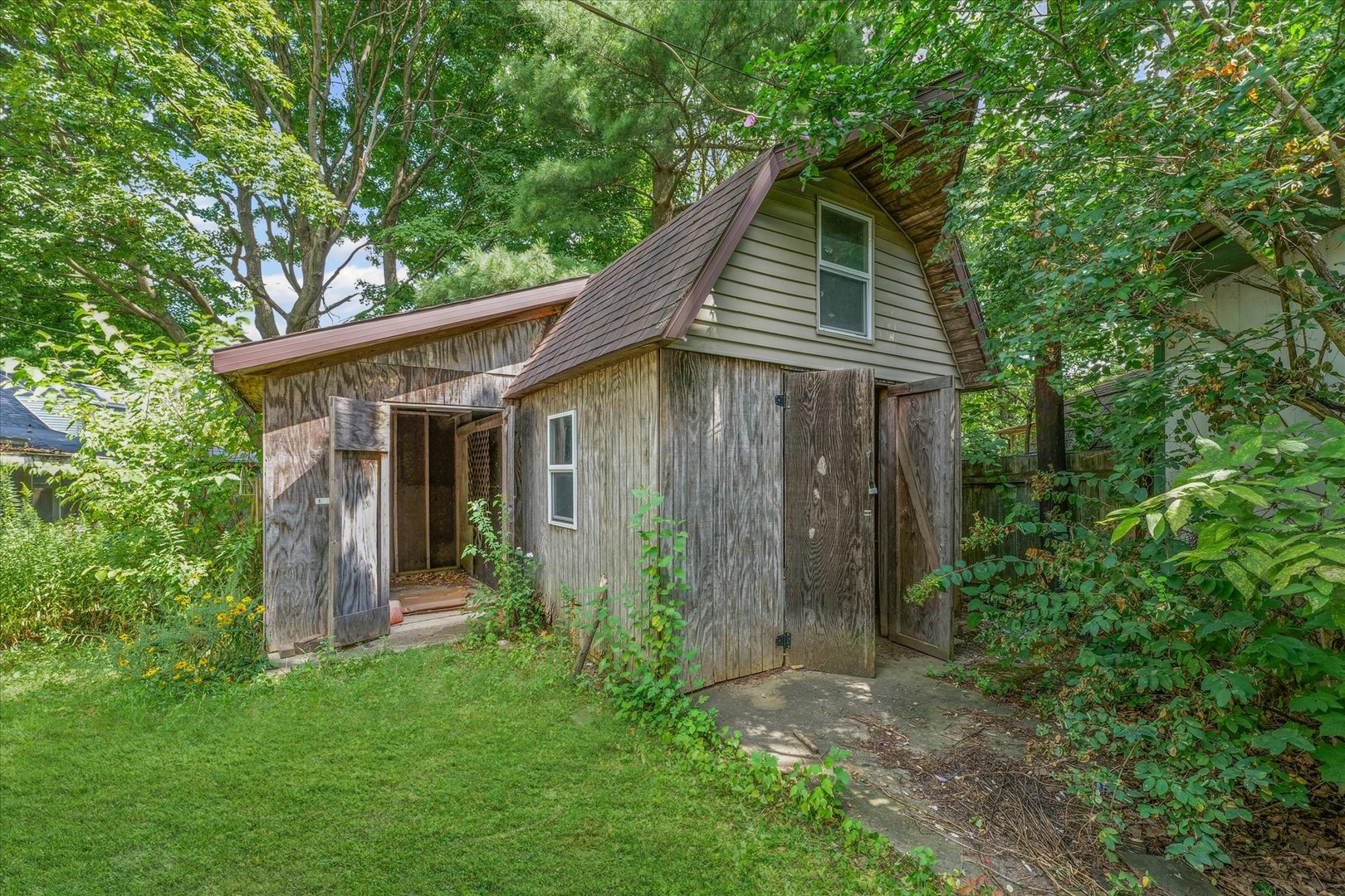 302 Flora Drive Champaign, IL 61821 - Photo 33 of 34 a view of a house with backyard