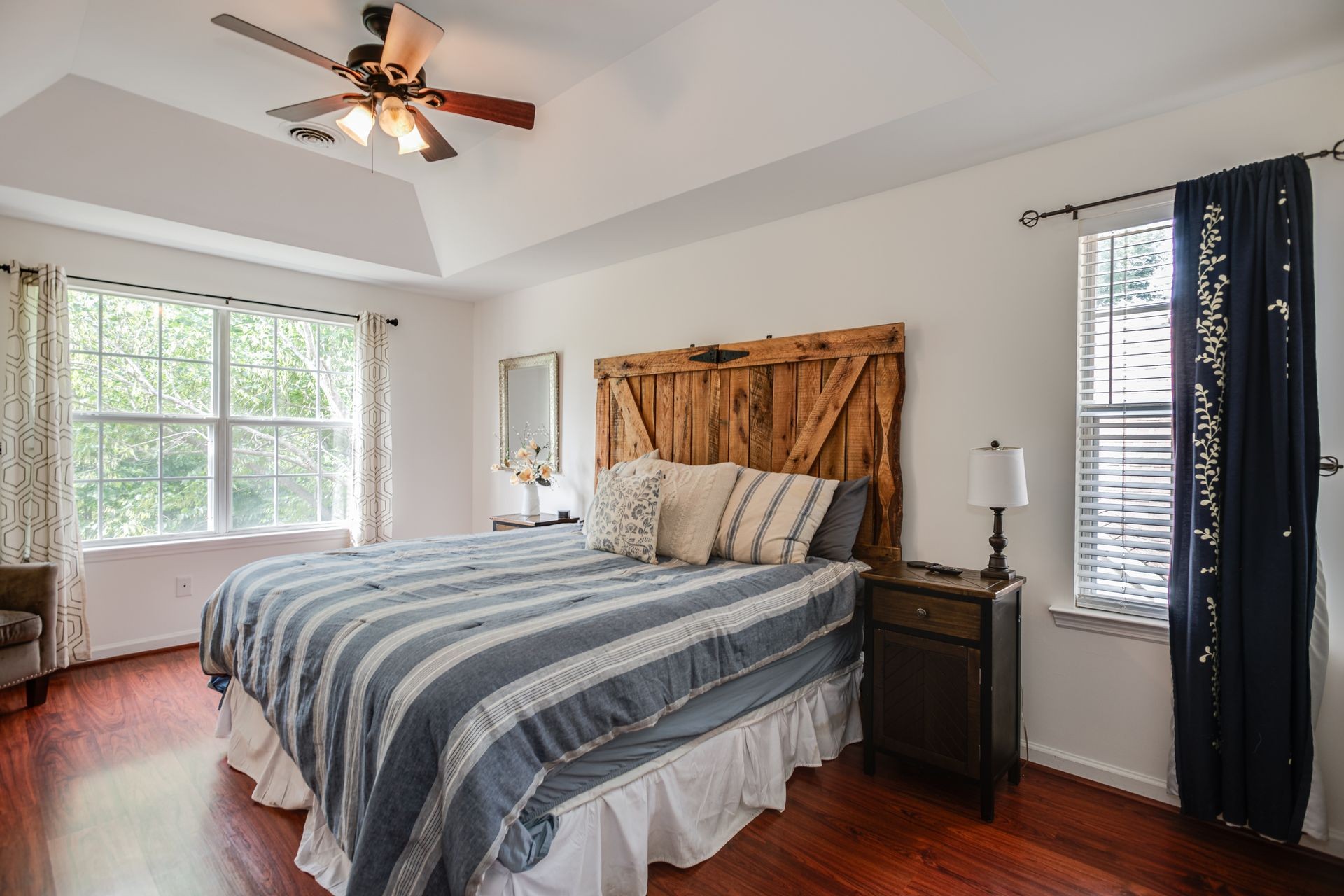 1065 Meandering Way Franklin, TN 37067 - Photo 16 of 33 a bedroom with a large bed and a window