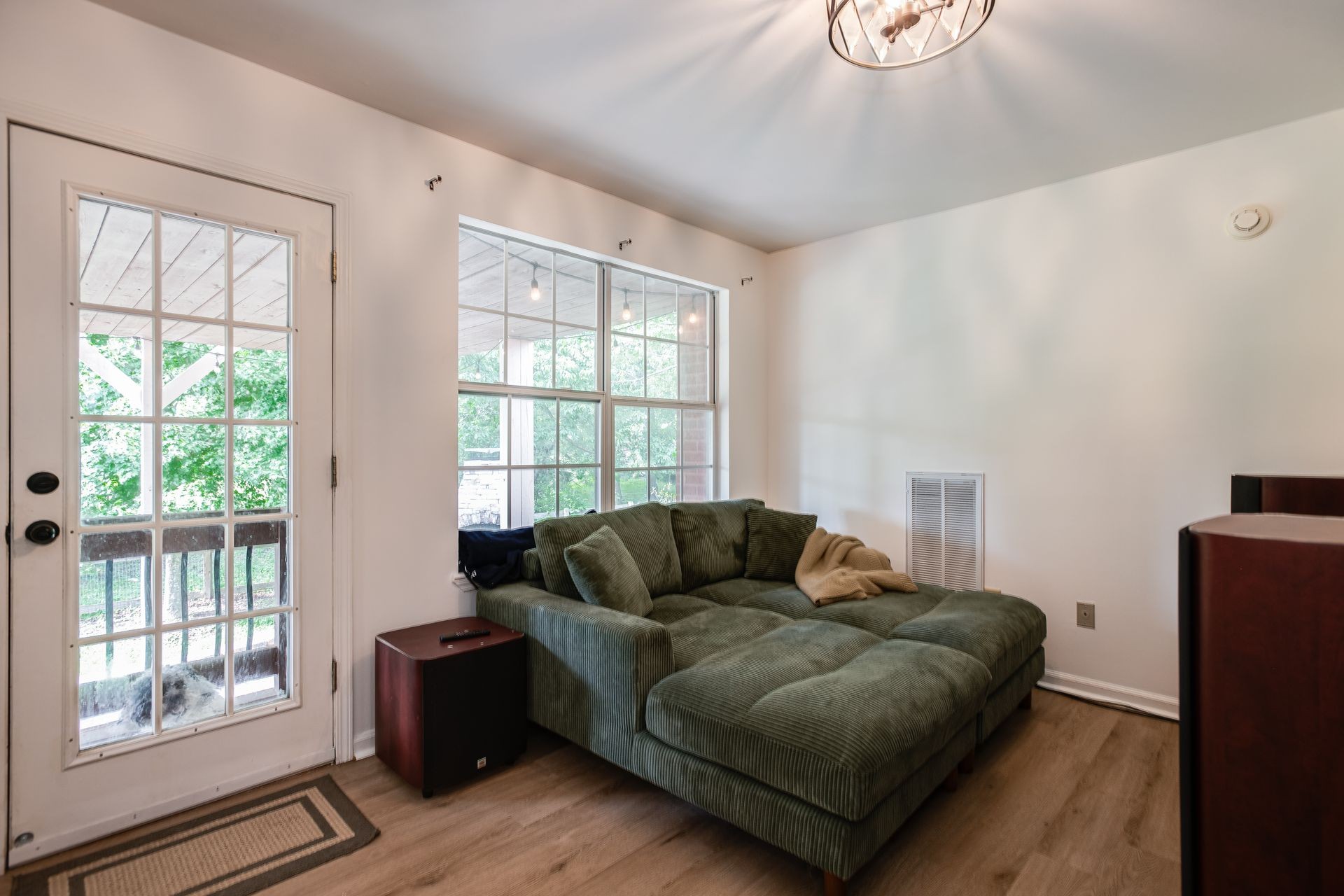 1065 Meandering Way Franklin, TN 37067 - Photo 22 of 33 a living room with furniture and a window