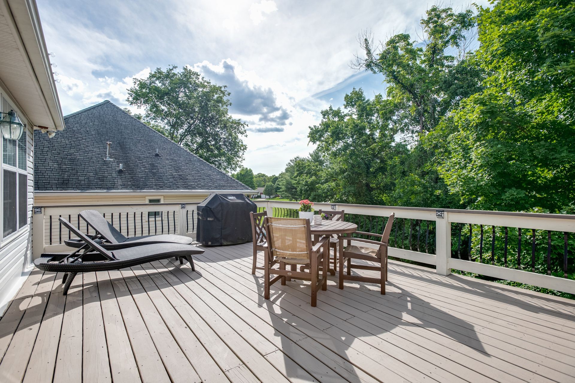 1065 Meandering Way Franklin, TN 37067 - Photo 26 of 33 a view of a wooden deck with a bench