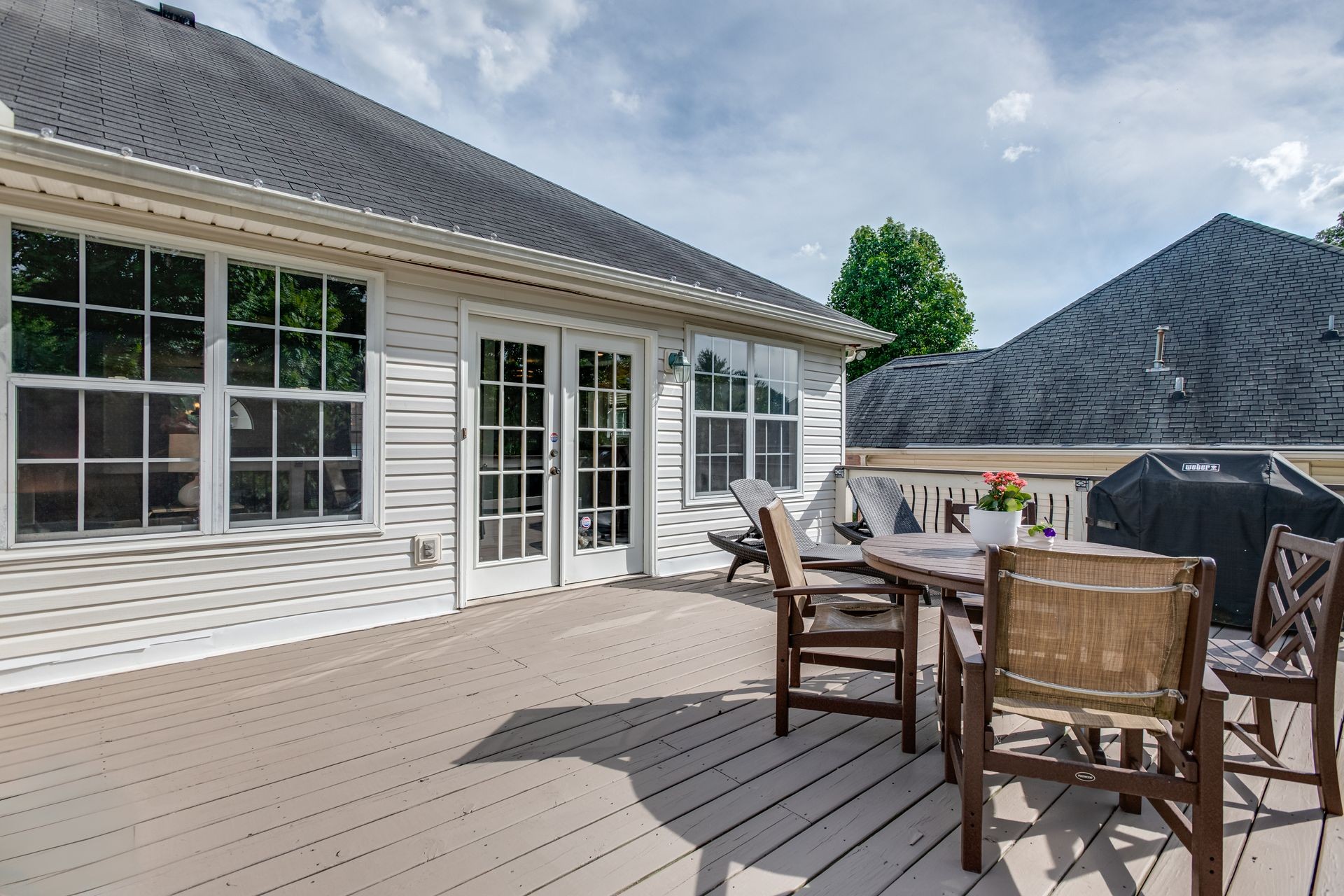 1065 Meandering Way Franklin, TN 37067 - Photo 27 of 33 a outdoor space with a wooden floor and furniture