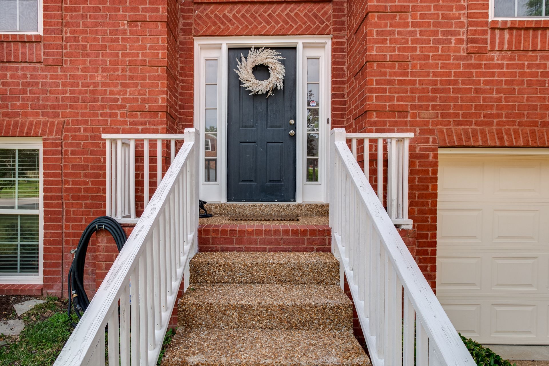1065 Meandering Way Franklin, TN 37067 - Photo 3 of 33 a view of balcony with wooden floor and brick wall