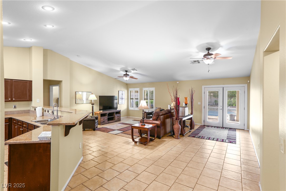 8928 Rusty Rifle Avenue Las Vegas, NV 89143 - Photo 5 of 23 Welcoming entry opens to a spacious living area wi