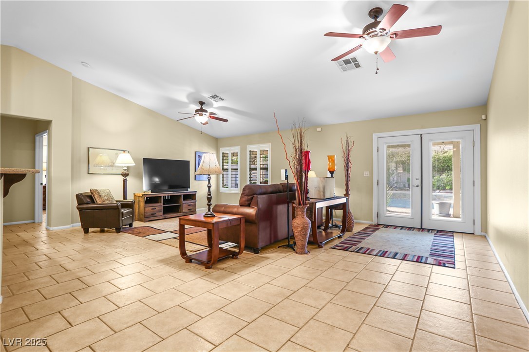8928 Rusty Rifle Avenue Las Vegas, NV 89143 - Photo 7 of 23 Spacious living area with vaulted ceilings, ceilin