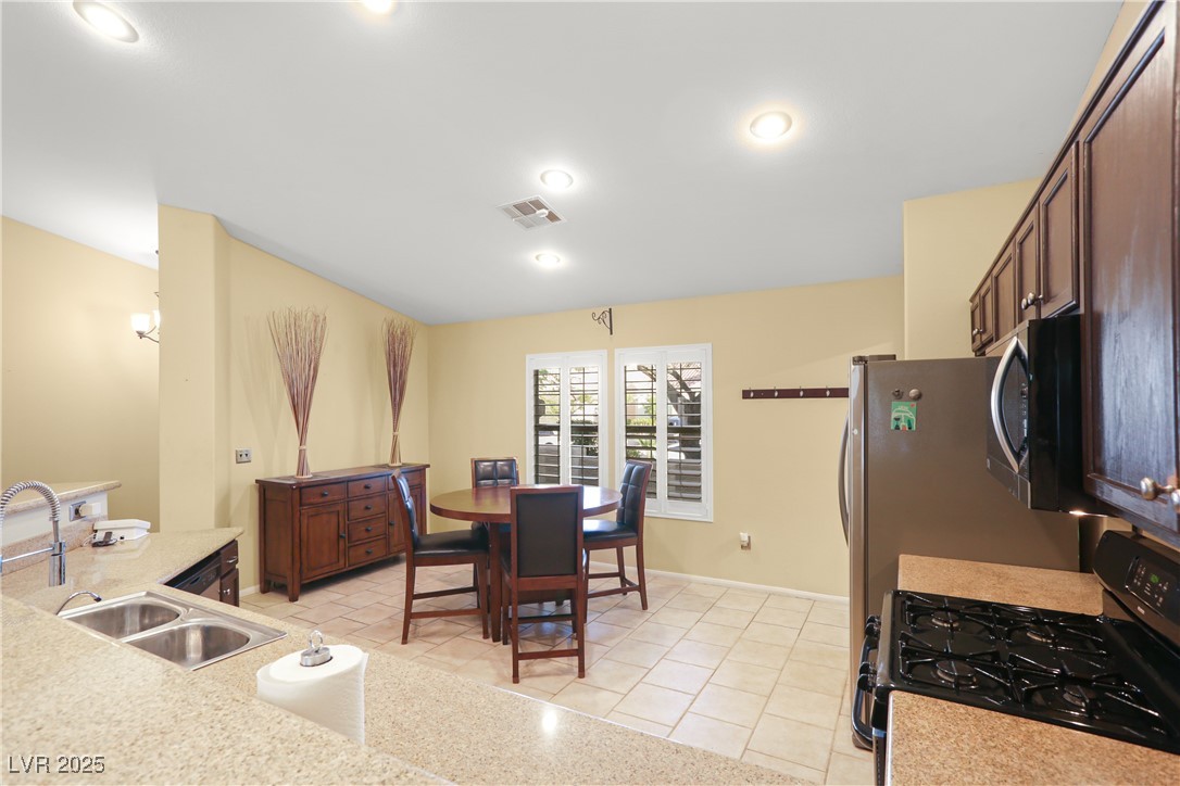 8928 Rusty Rifle Avenue Las Vegas, NV 89143 - Photo 10 of 23 Cozy breakfast nook bathed in natural light, offer