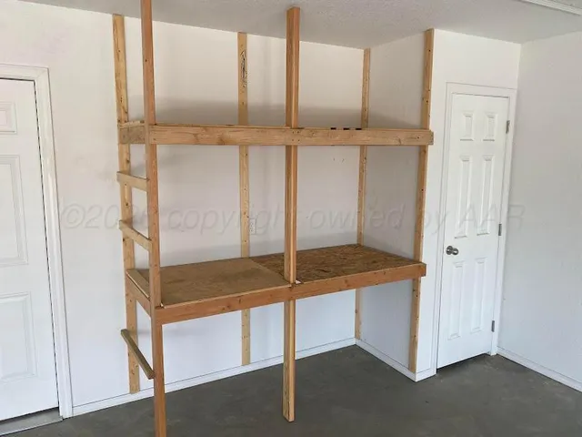 a view of a hallway with entryway