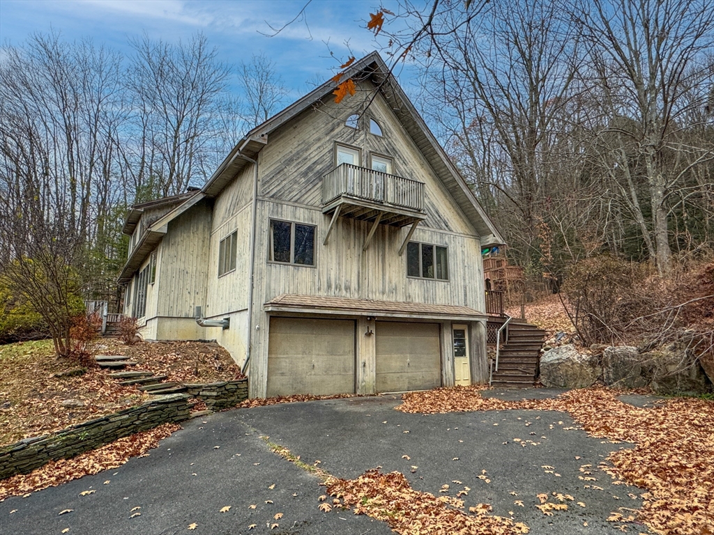 519 Kirchner Road Dalton, MA 01226 - Photo 2 of 35 a view of a white house with a large tree