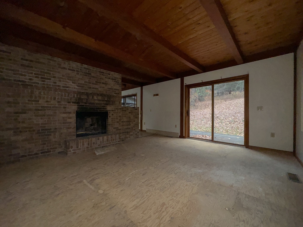 519 Kirchner Road Dalton, MA 01226 - Photo 21 of 35 a view of empty room with a fireplace
