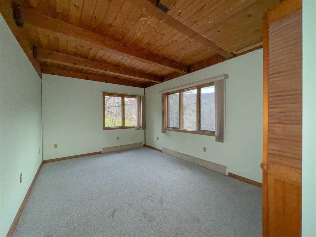 519 Kirchner Road Dalton, MA 01226 - Photo 24 of 35 a view of an empty room with windows