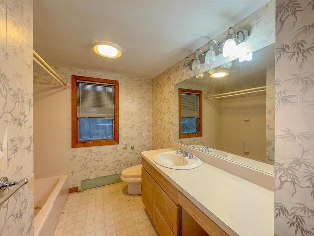 519 Kirchner Road Dalton, MA 01226 - Photo 25 of 35 a bathroom with a sink double vanity and a mirror