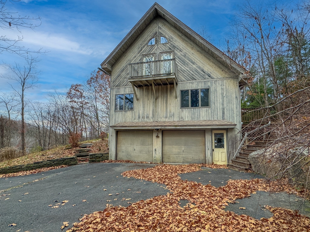 519 Kirchner Road Dalton, MA 01226 - Photo 3 of 35 a front view of a house with a yard