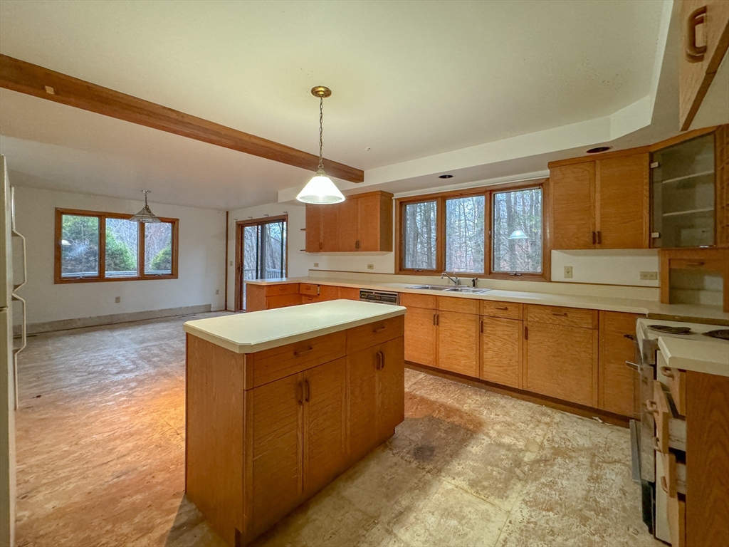 519 Kirchner Road Dalton, MA 01226 - Photo 33 of 35 a kitchen with stainless steel appliances granite countertop a stove and a sink