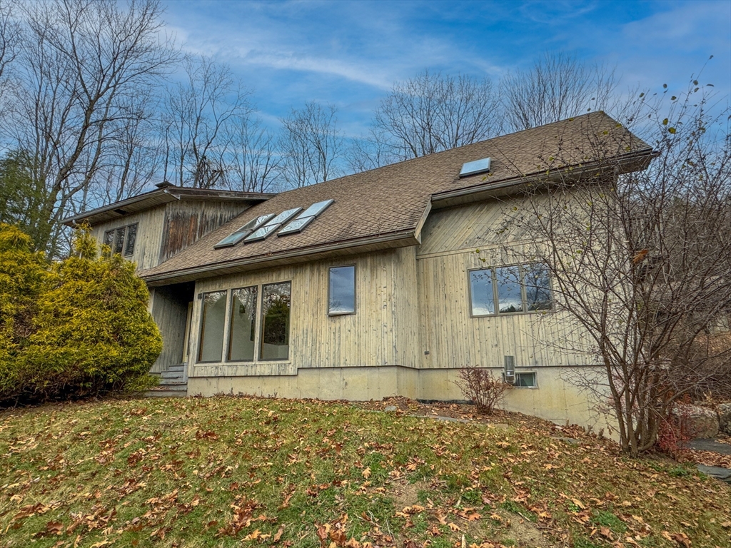 519 Kirchner Road Dalton, MA 01226 - Photo 4 of 35 a front view of a house with a garden