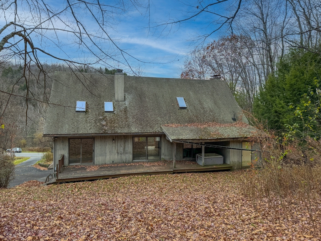 519 Kirchner Road Dalton, MA 01226 - Photo 7 of 35 a front view of a house with a yard