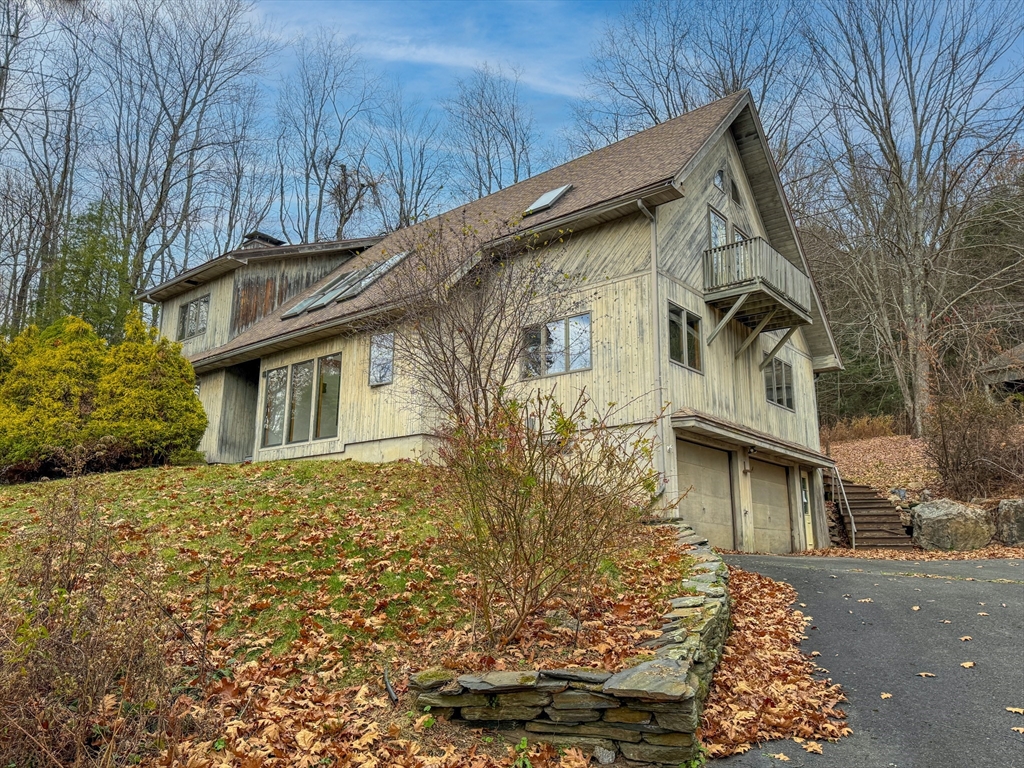 519 Kirchner Road Dalton, MA 01226 - Photo 9 of 35 a front view of a house with a yard