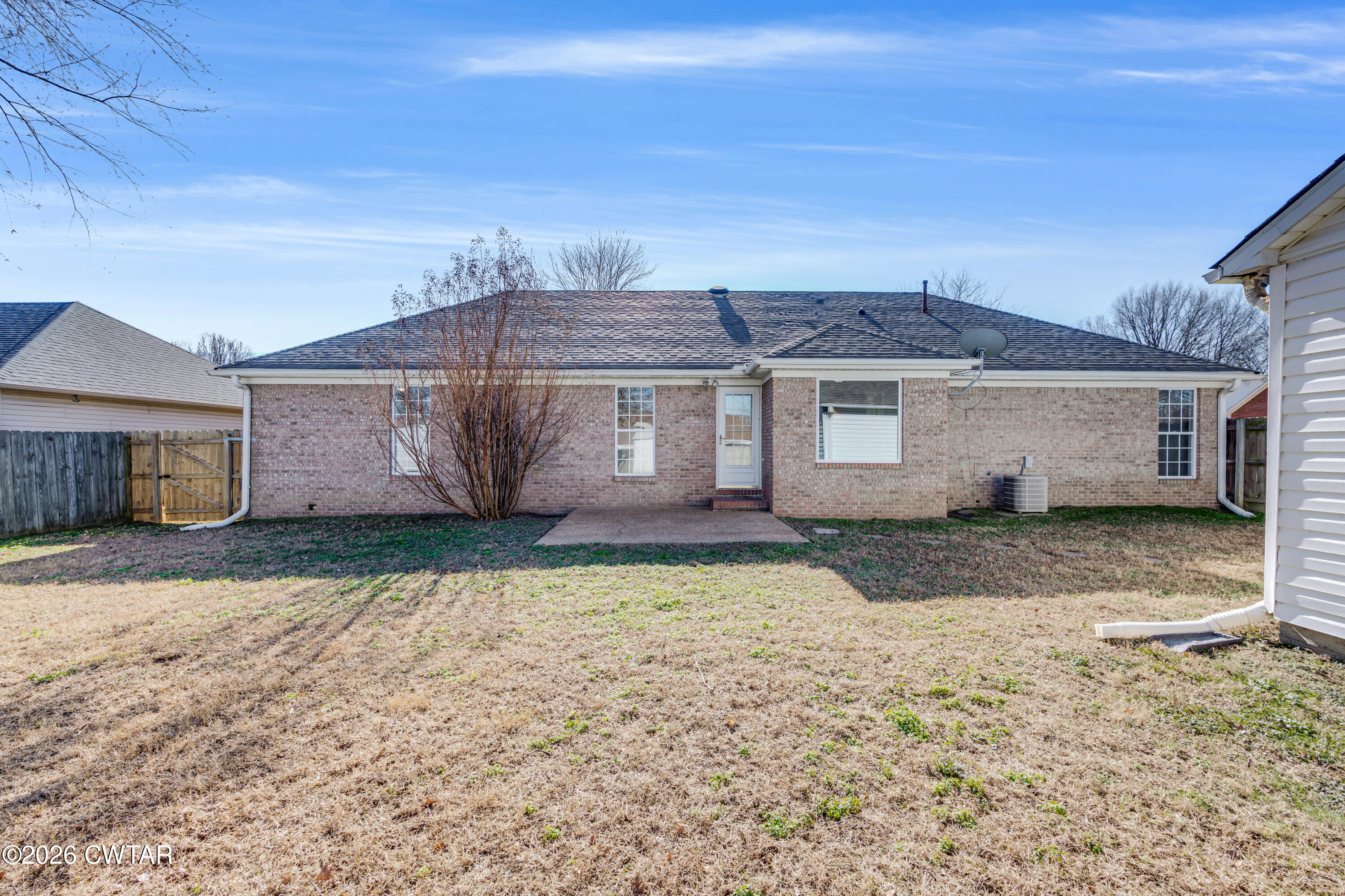 75 Suncrest Drive Jackson, TN 38305 - Photo 14 of 24 a house view with a backyard space