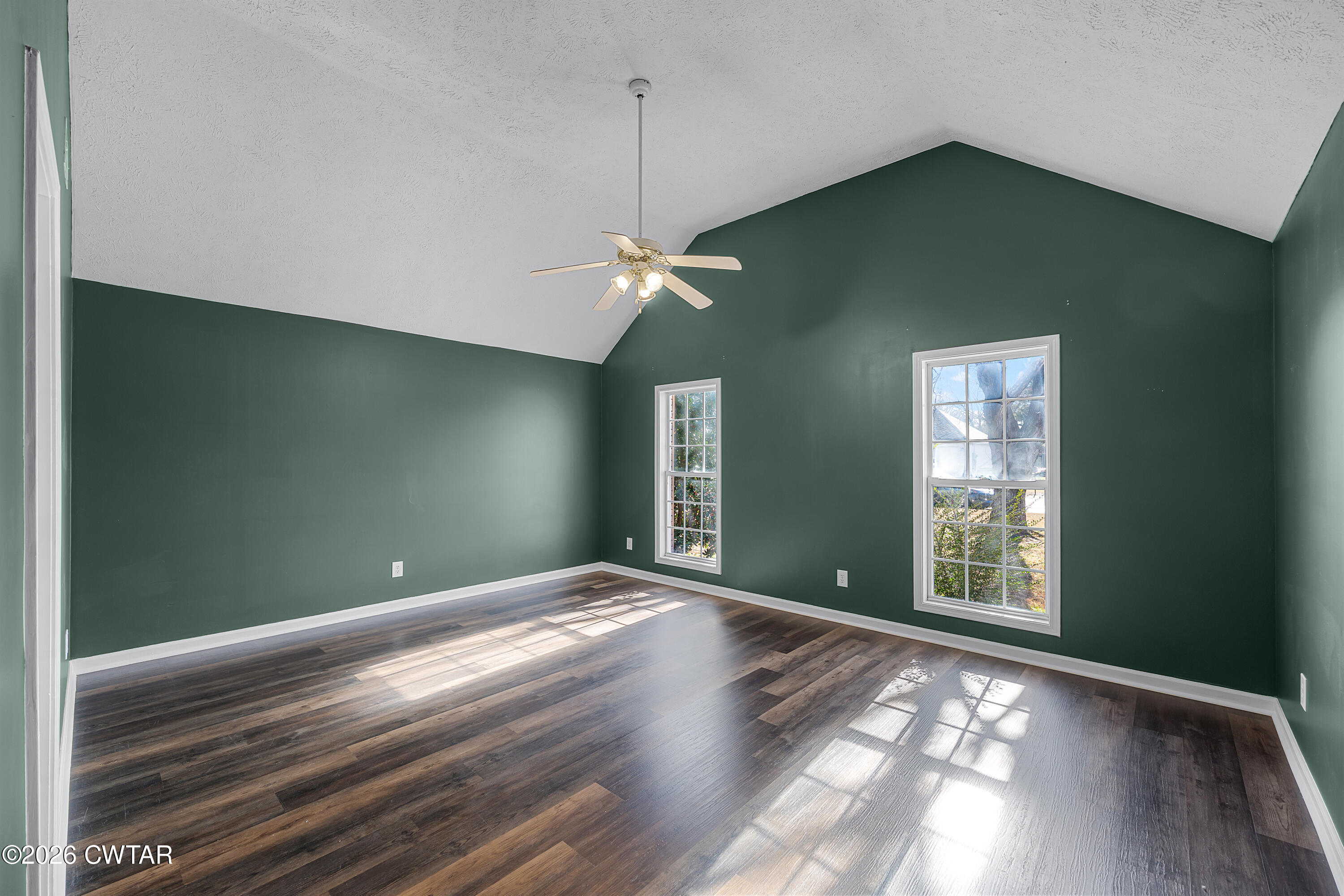 75 Suncrest Drive Jackson, TN 38305 - Photo 18 of 24 a view of an empty room with window and fan