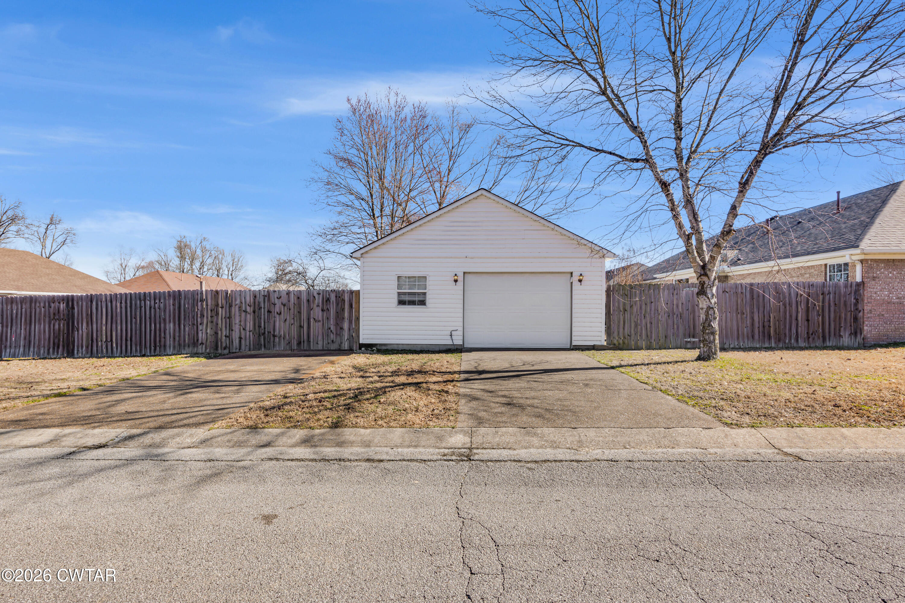 75 Suncrest Drive Jackson, TN 38305 - Photo 23 of 24 a big house with wooden fence