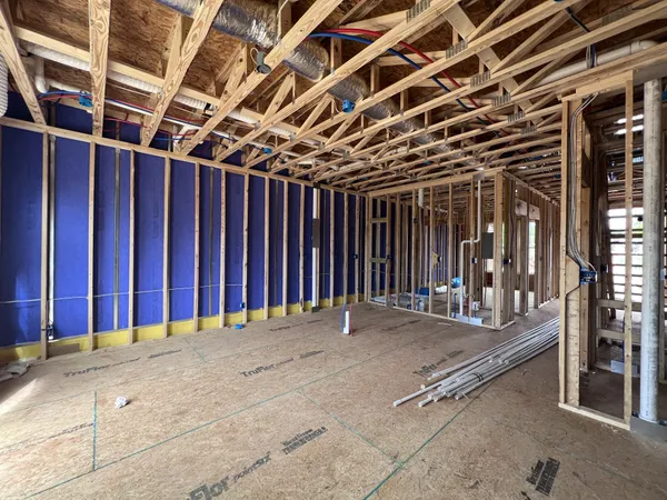 a view of large room with wooden walls