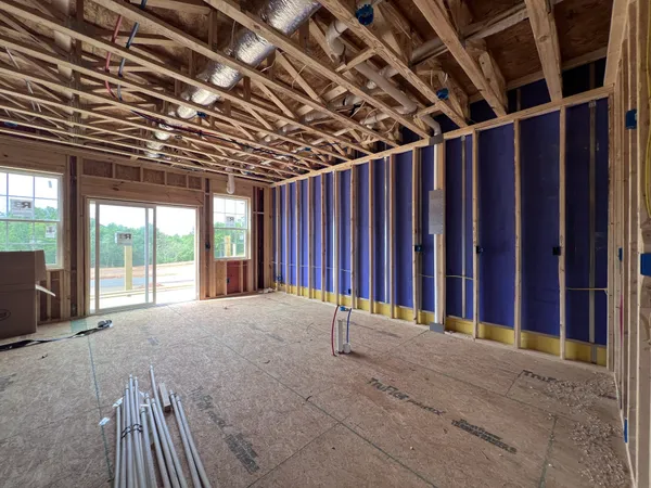 a view of large room with wooden walls