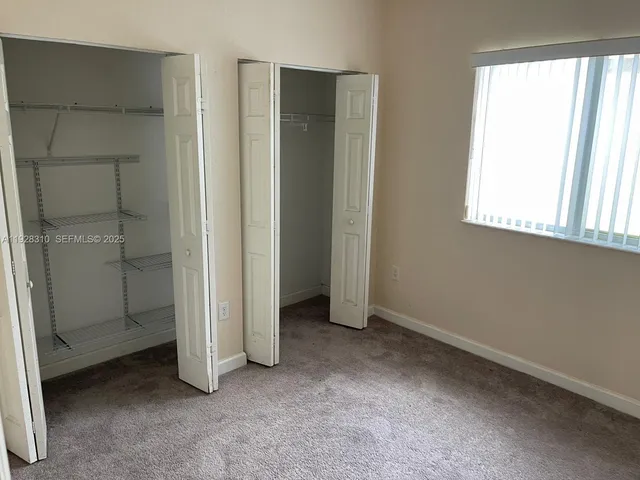 a bathroom with a shower and a bathtub