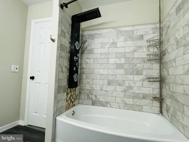 a bathroom with a bathtub