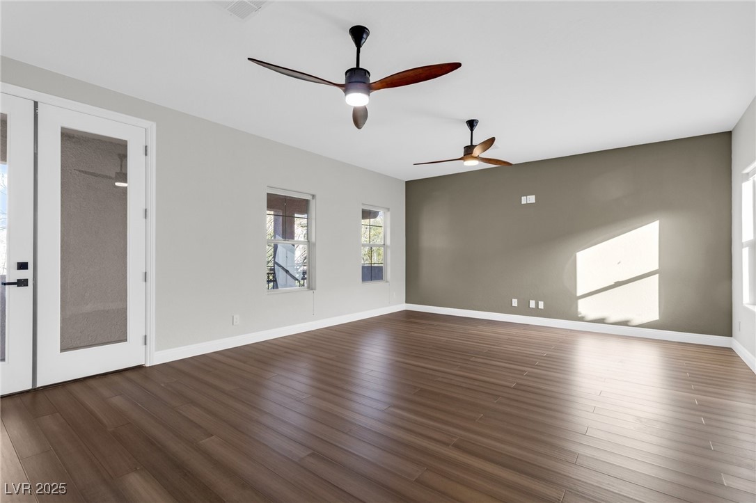 2805 Proust Court Henderson, NV 89044 - Photo 13 of 43 Media Room featuring real bamboo wood floors, baseboards, and ceiling fan