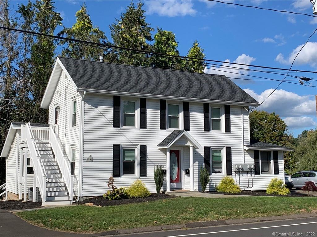 368 Boston Street Guilford, CT 06437 - Photo 1 of 24 a front view of a house with a yard